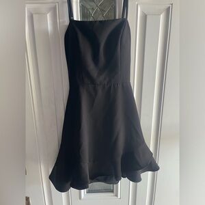 Dear Moon brand Black dress with ruffle hem BNWT